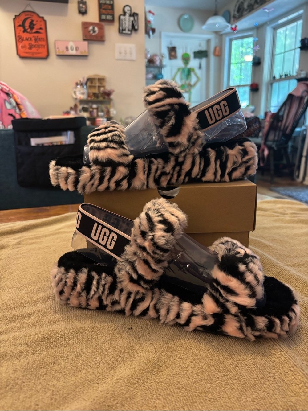 UGG Women’s Pink and Black Zebra Faux-Fur Slide Sandals